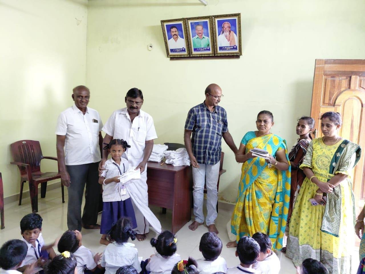 School uniform handed to young student