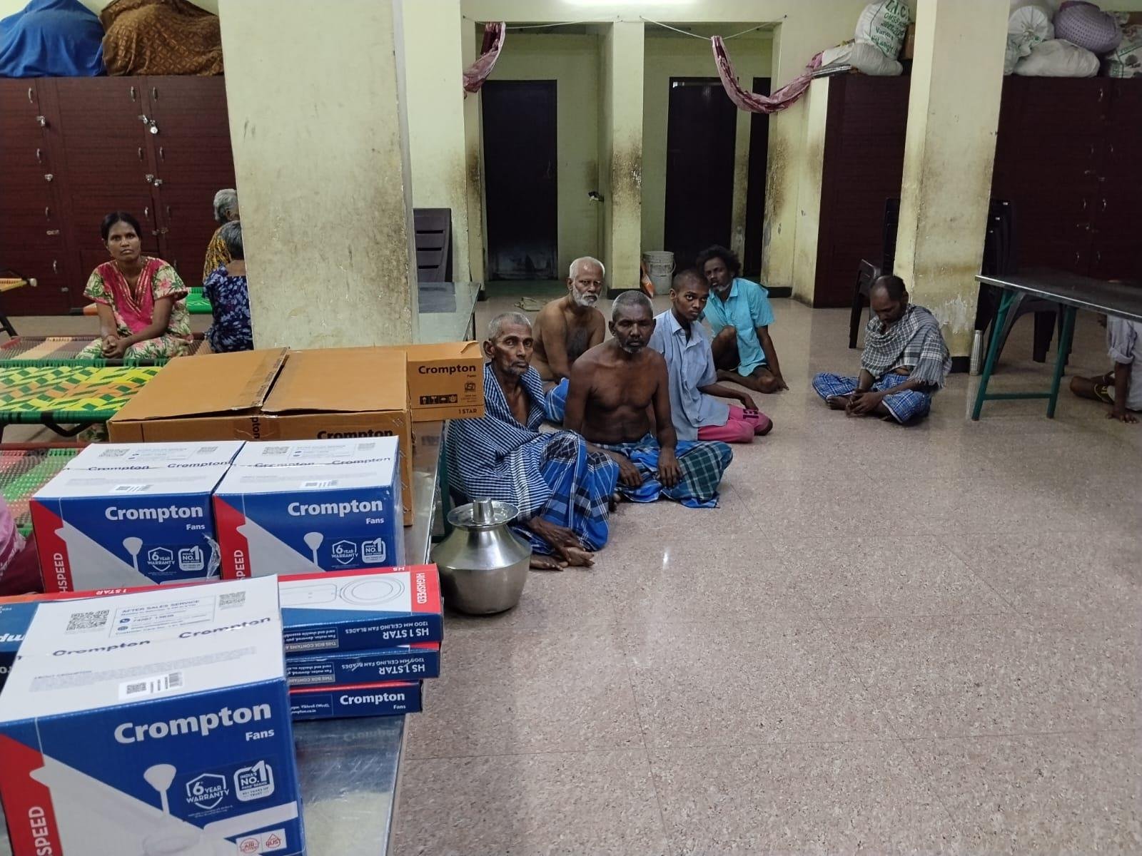 Ceiling fan donation at shelter home