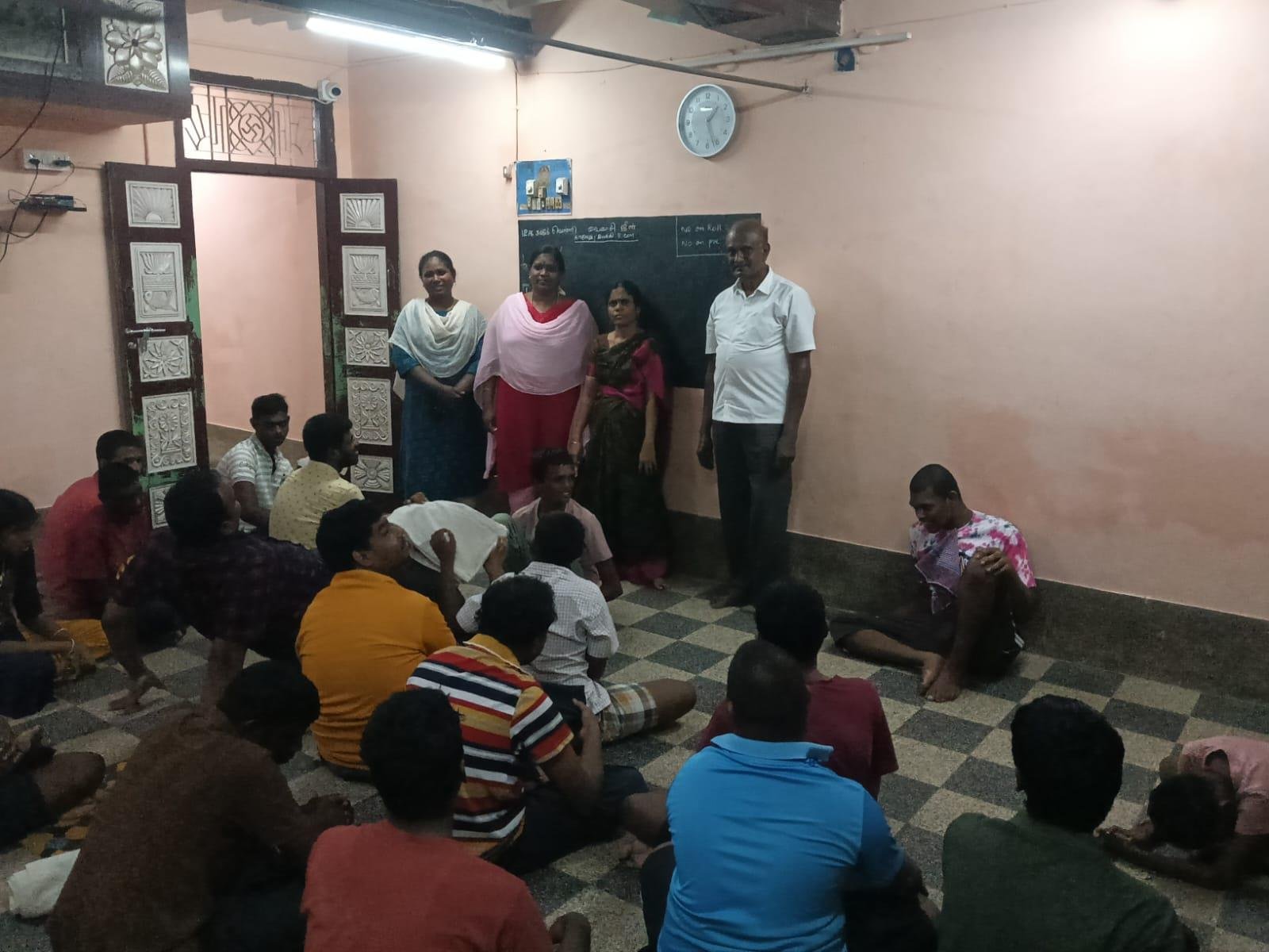 Community meeting with NGO facilitators
